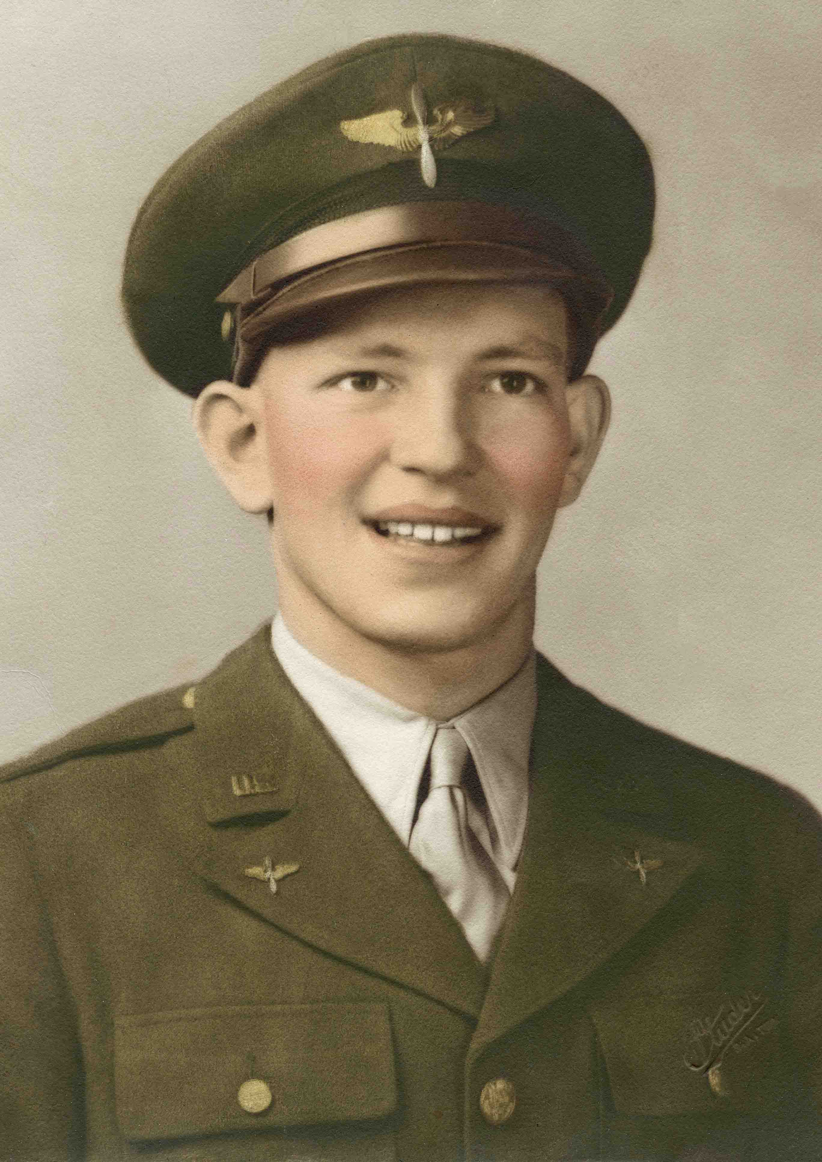 Formal portrait of Air Force TSGT. Howard F. Ayers in uniform