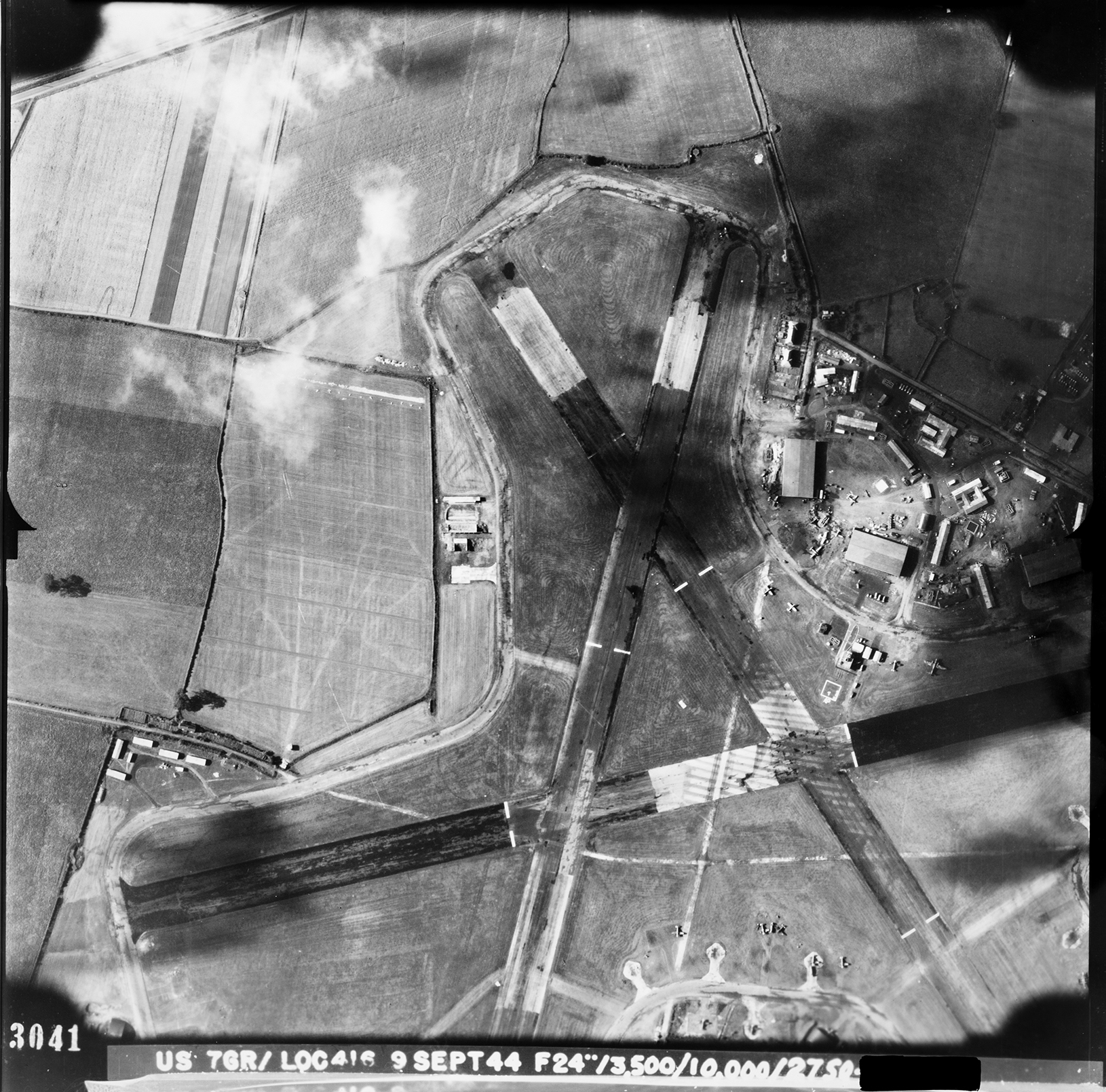 Aerial photograph of the south west of Atcham airfield, looking south east, the control tower and technical site- with T2 hangars- is to the right, 9 September 1944. Photograph taken by 7th Photographic Reconnaissance Group, sortie number US/7GR/LOC416. English Heritage (USAAF Photography).