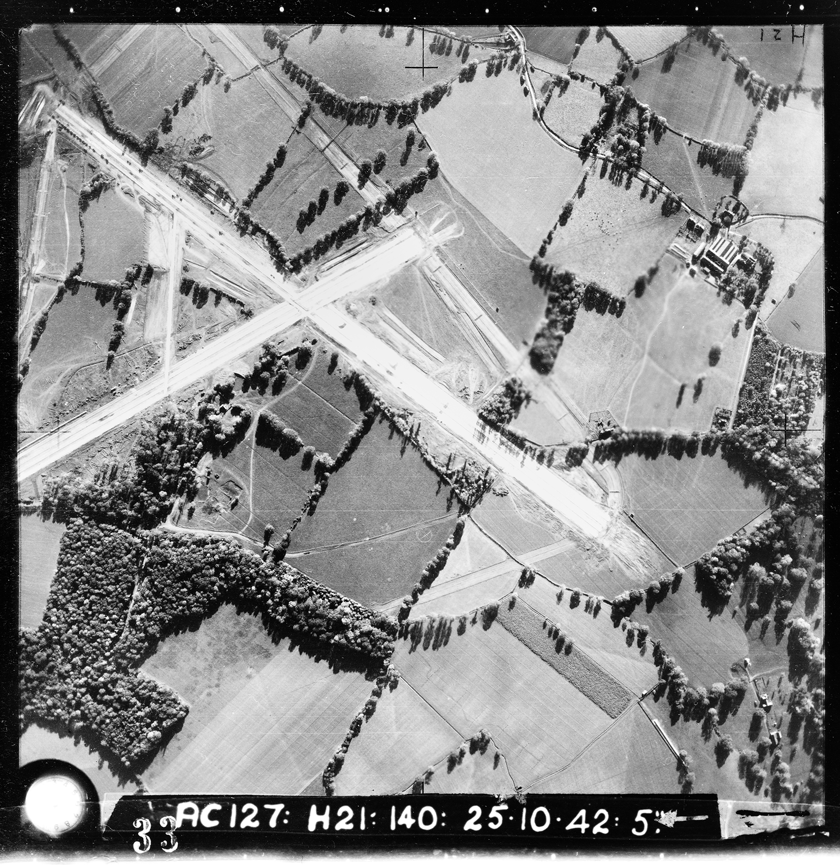 Aerial photograph of the south end of Chipping Ongar airfield, looking east, under construction by the 831st Engineering Battalion (Aviation), 25 October 1942. Photograph taken on sortie number RAF/AC127. English Heritage (RAF Photography).