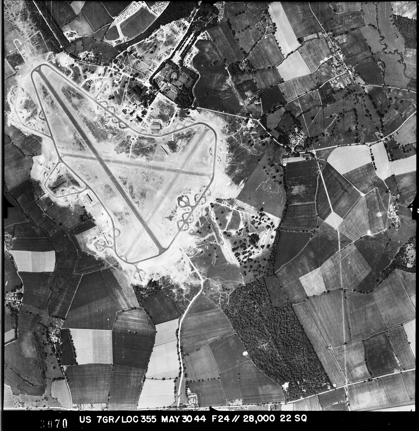 Aerial photograph of Great Dunmow airfield looking north, Easton lodge is upper middle, 30 May 1944. Photograph taken by 7th Photographic Reconnaissance Group, sortie number US/7GR/LOC355. English Heritage (USAAF Photography).