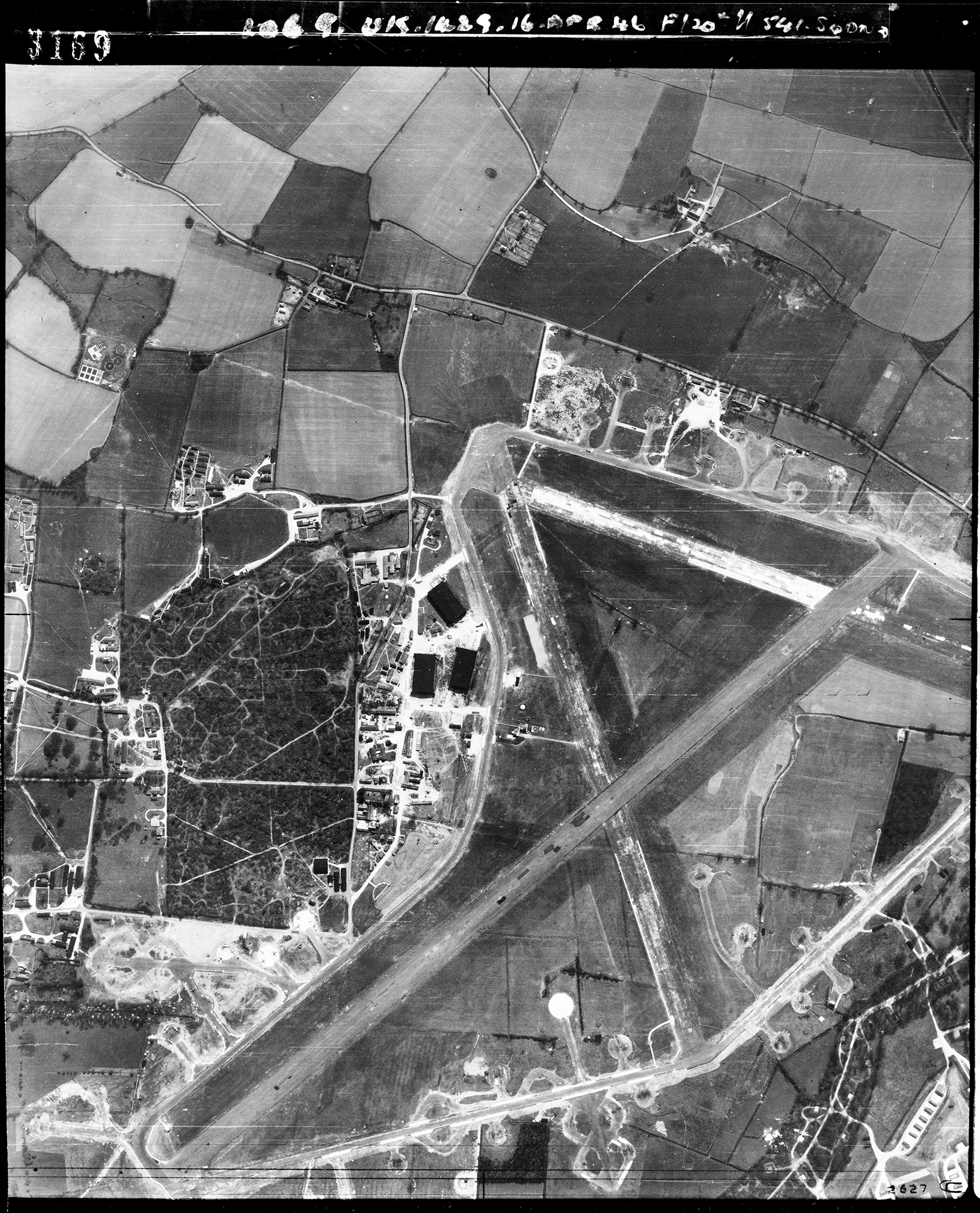 Aerial photograph of Hethel airfield, looking south, the technical site with three T2 hangars is left, 16 April 1946. Photograph by No. 541 Squadron, sortie number RAF/106G/UK/1429. English Heritage (RAF Photography).