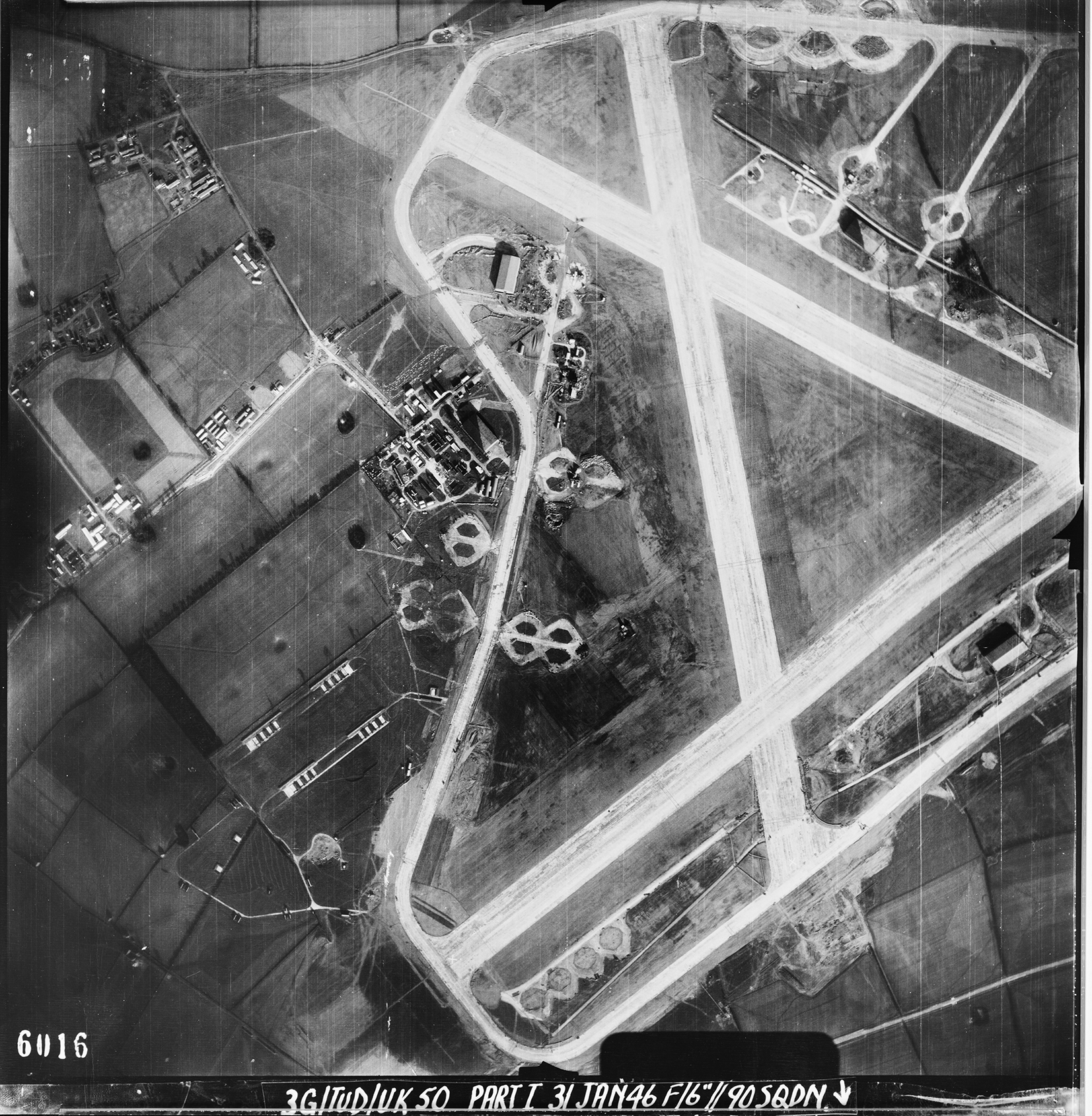 Aerial photograph of Sculthorpe airfield looking north, the technical and bomb dump are on the left, 31 January 1946. Photograph taken by No. 90 Squadron, sortie number RAF/3G/TUD/UK/50. English Heritage (RAF Photography).