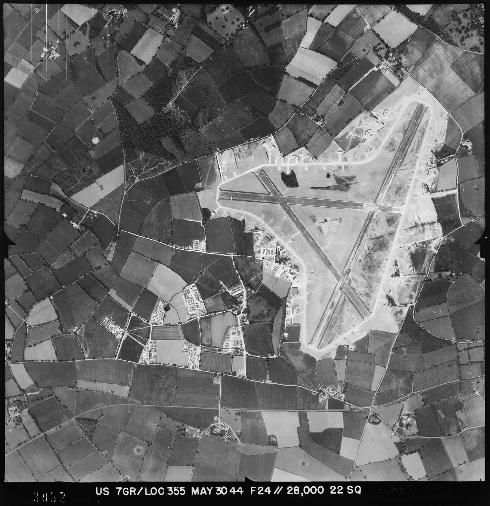 Aerial photograph of Leiston airfield looking north east, the technical site, admin site and sick quarters are to the left, 30 May 1944. Photograph taken by 7th Photographic Reconnaissance Group, sortie number US/7GR/LOC355. English Heritage (USAAF Photography).