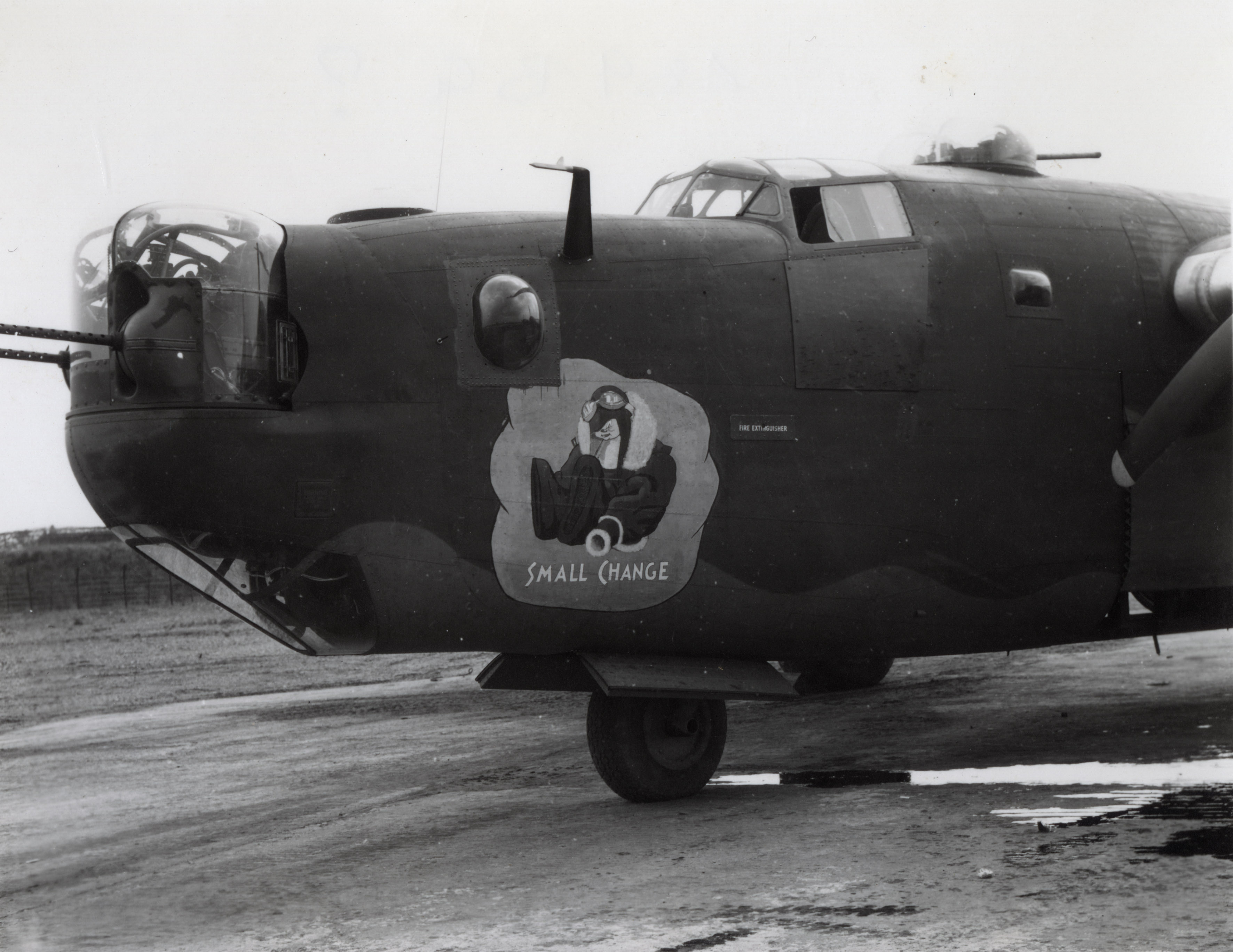 The nose art of a B-24 Liberator nicknamed "Small Change" of the 489th Bomb Group.