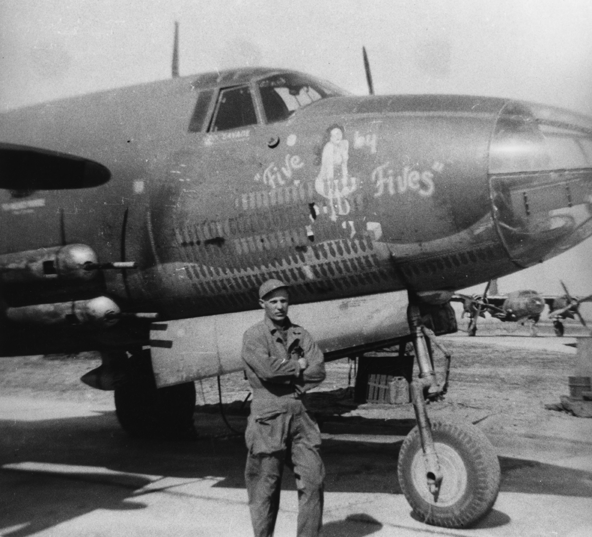 Technical Sergeant George Corwin of the 387th Bomb Group with a B-26 Marauder (serial number 41-31707) nicknamed "Five by Fives". Image via A Crouchman.