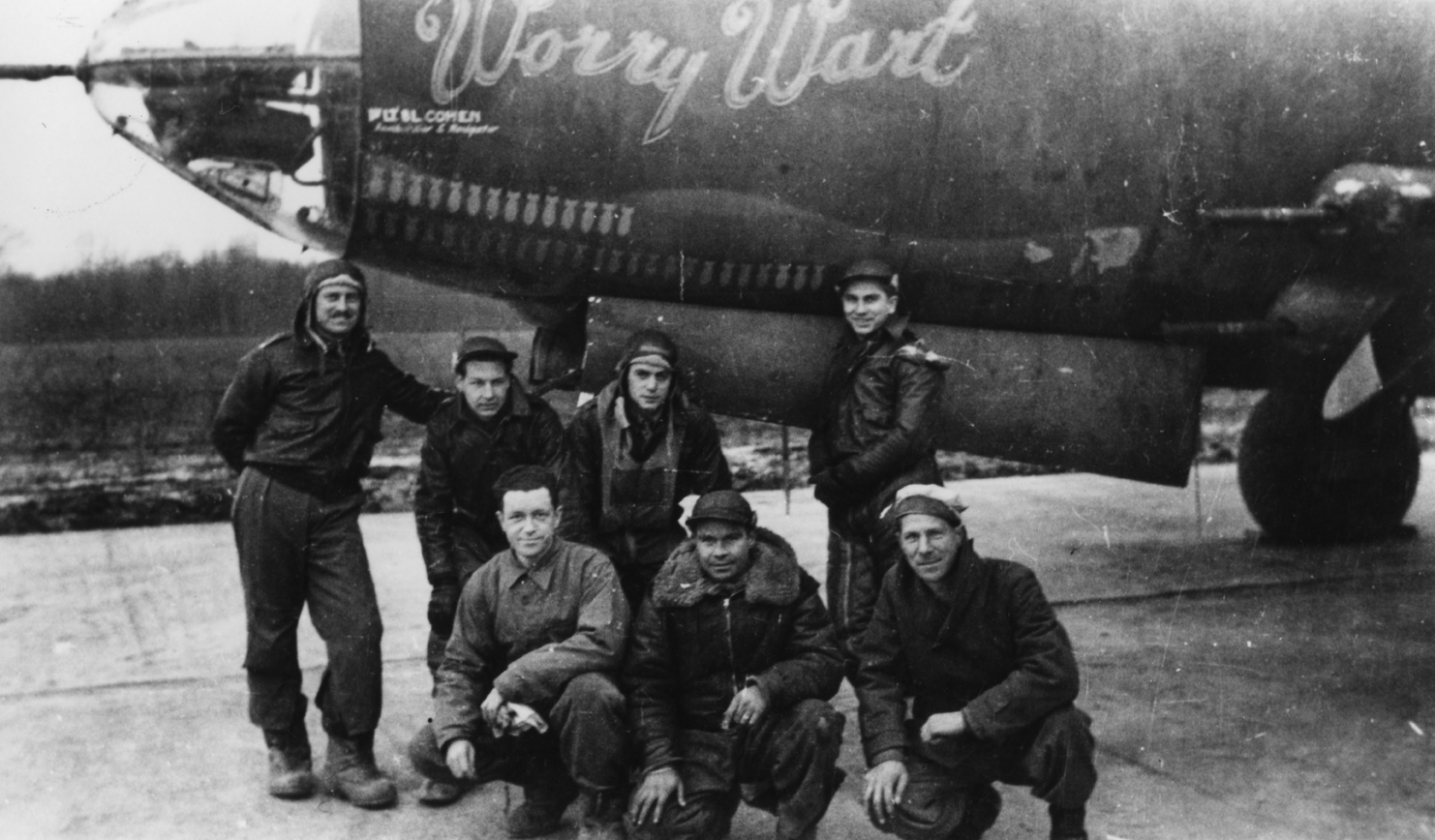 A bomber crew of the 387th Bomb Group with their B-26 Marauder nicknamed "Worry Wart".