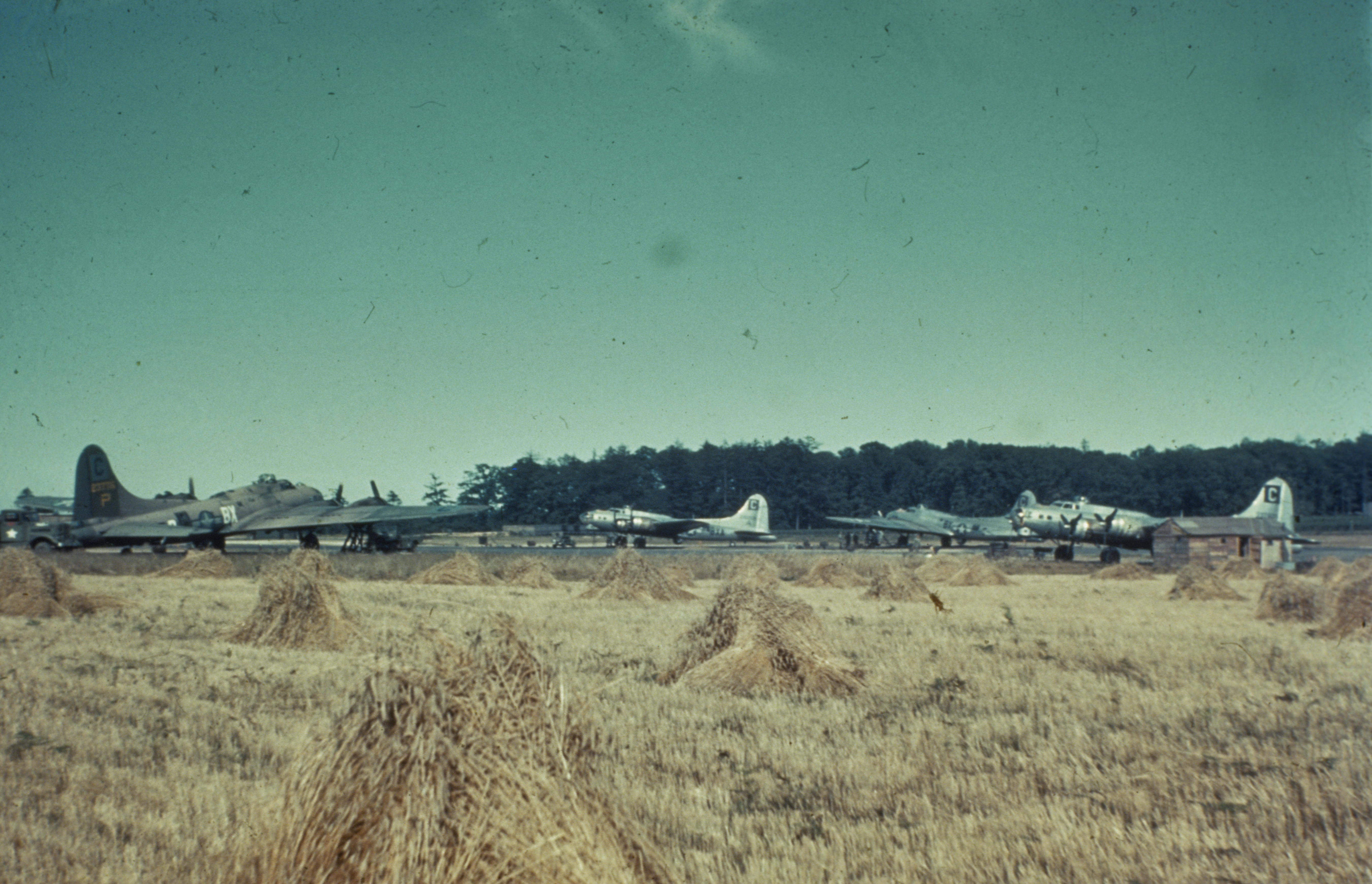 B-17 Flying Fortresses of the 96th Bomb Group at Snetterton Heath. Image via Mark Brown, AFA. Written on slide casing: 'BX dispersals Snetterton.'