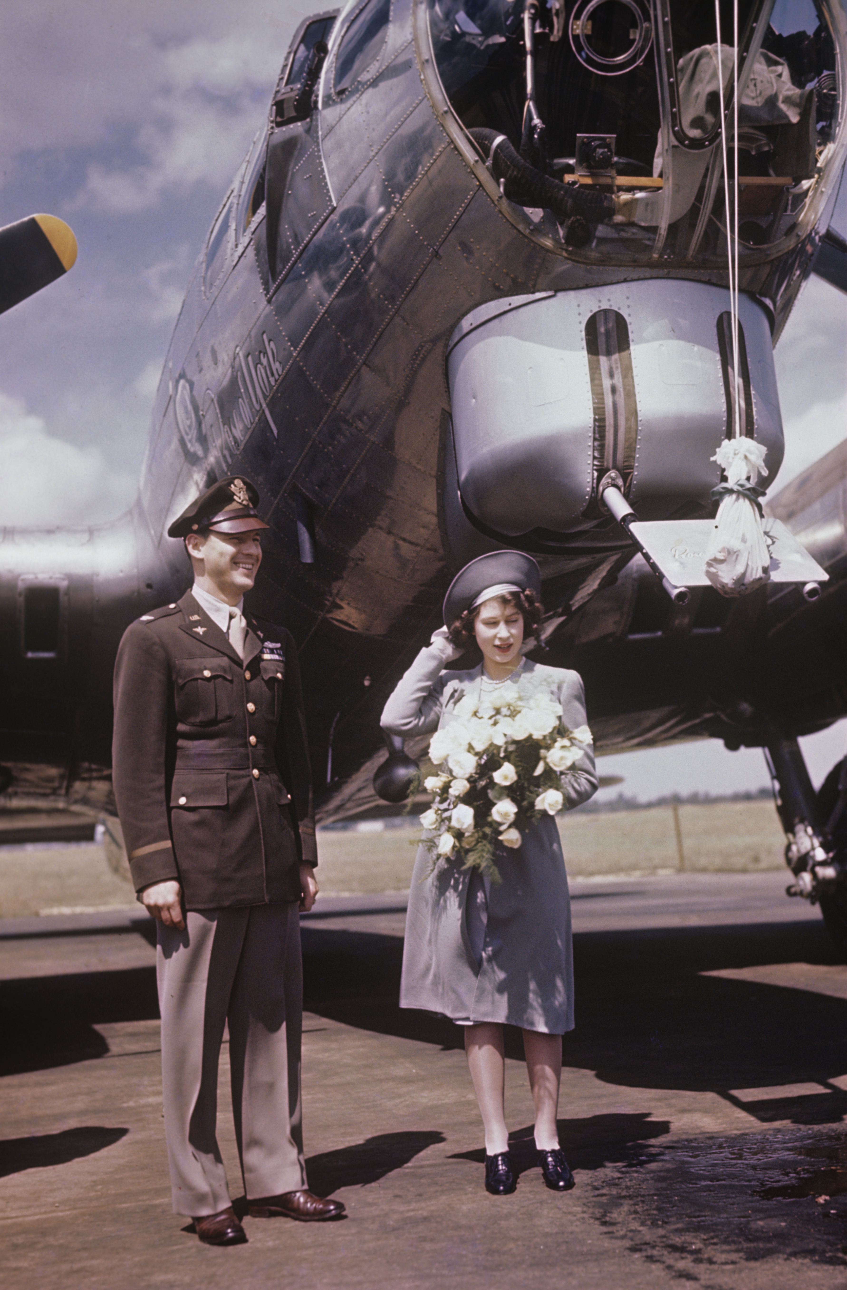 Princess Elizabeth and an airman of the 306th Bomb Group with a B-17 Flying Fortress (serial number 42-102547) nicknamed "Rose of York", that has been named in her honour, 6 July 1944. Written on slide casing: 'Rose of York.' 