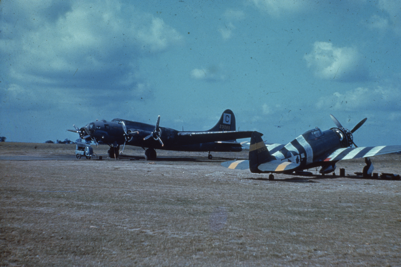 A B-17 Flying Fortress (serial number 43-3069) of the 96th Bomb Group and a P-47 Thunderbolt (serial number 42-8190) of the 5th Emergency Rescue Squadron. Image via Mark Brown, AFA. Written on slide casing: 'Snetterton Heath, B-17 and A/S/R P-47.'