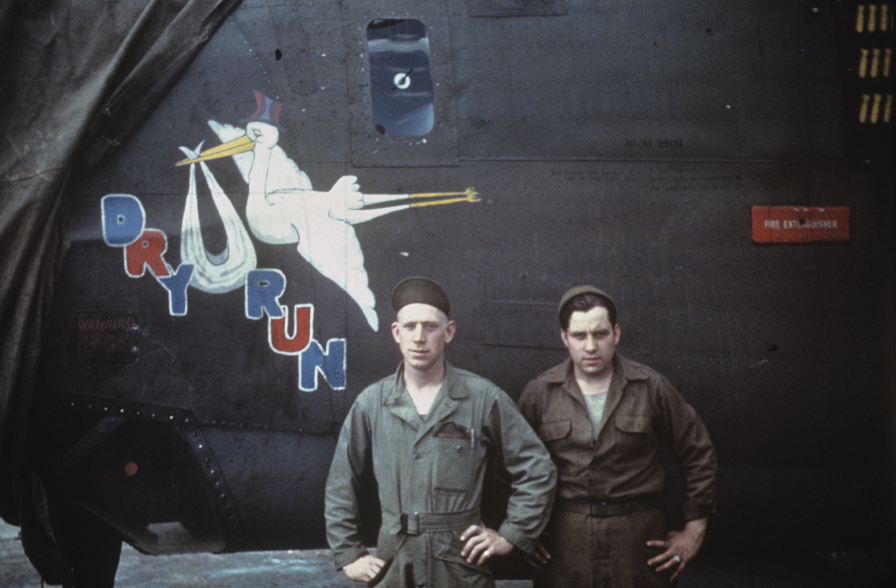 Armorers of the 706th Bomb Squadron, 446th Bomb Group with a B-24 Liberator (RT-R, serial number 41-29137) nicknamed "Dry Run". Image via Albert R Krassman Jr Written on slide casing: '706 Armament.'