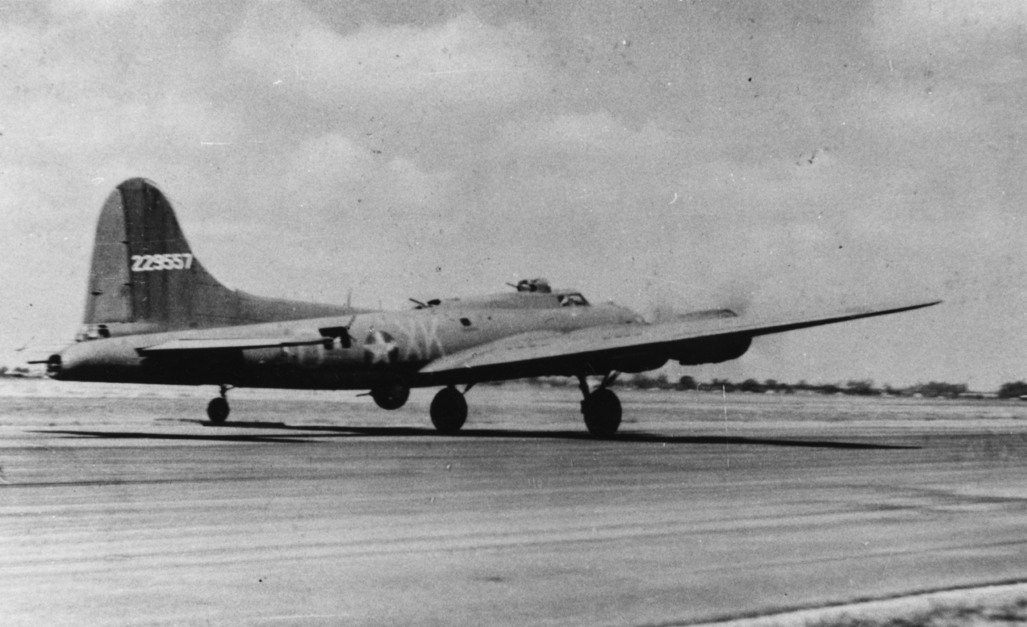 A B-17 Flying Fortress (XK-D, serial number 42-29557) of the 365th Bomb Squadron, 305th Bomb Group takes off. Handwritten caption on reverse: '30/6/43.'