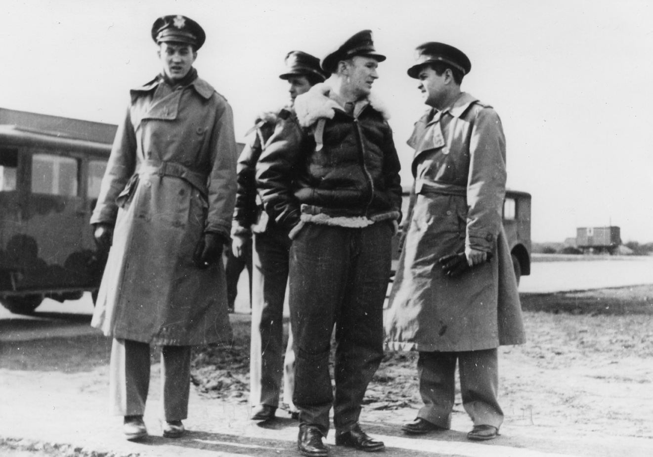 Colonel Curtis LeMay commander of the 305th Bomb Group with Haywood S. Hansell. Handwritten caption on reverse: '3. De Russey, Le May, Hansell.'