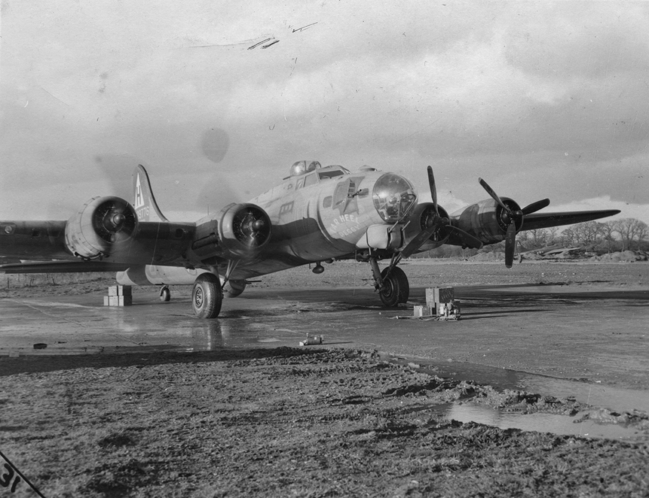 A B-17 Flying Fortress of the 306th Bomb Group, fitted with a chin turret. Marked "Not To Be Published" 25 Nov 1943. Printed caption on reverse: 'Flying Fortress's New Chin Turret. Associated Press Photo Shows:- The new chin turret - so-called because it is fitted under the "chin" of the aircraft - is the latest addition to the armour of the Flying Fortress. These pictures show different views of the turret and its two .50 calibre machine-guns. GLE 262629/30/1/2/3. 25-11-43-Y.' On reverse: Ministry of Inf