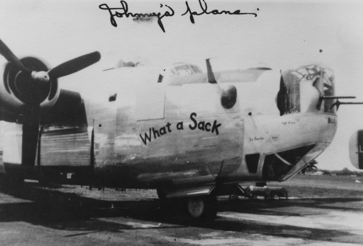 A B-24 Liberator (serial number 42-51247) nicknamed "What a Sack" of the 93rd Bomb Group. Handwritten note on front of print: "Johnny's Flame." Handwritten note on reverse of print: '93 BG. 251247.'