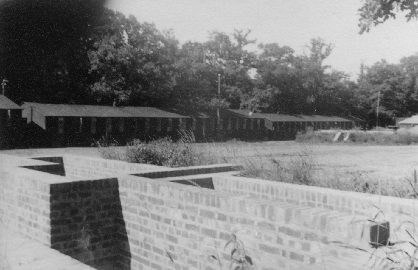 Barracks at Exeter, home of the 440th Troop Carrier Group. Handwritten caption on reverse: 'Exeter: Barracks.'