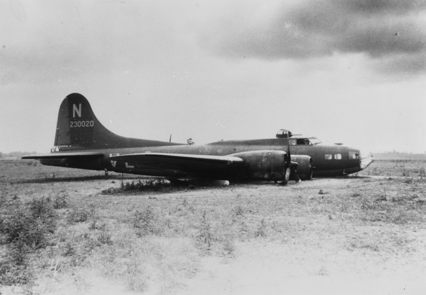 A crashed B-17 Flying Fortress (VE-N, serial number 42-30020) of the 532nd Bomb Squadron, 381st Bomb Group, 6 September 1943. Handwritten caption on reverse: '1. 9/6/43 photo.'