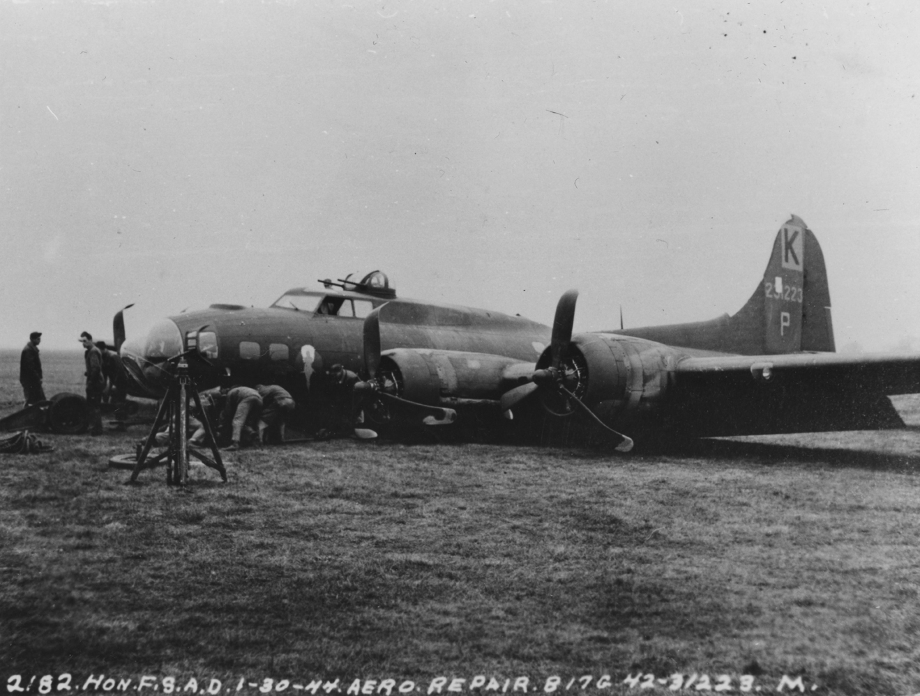 A crashed B-17G Flying Fortress (serial number 42-31223) of the 447th Bomb Group, 30 January 1945 Official caption on image: "2182. Hon. FSAD. 1-30-44. Aero Repair. B-17G. 42-31223 M."