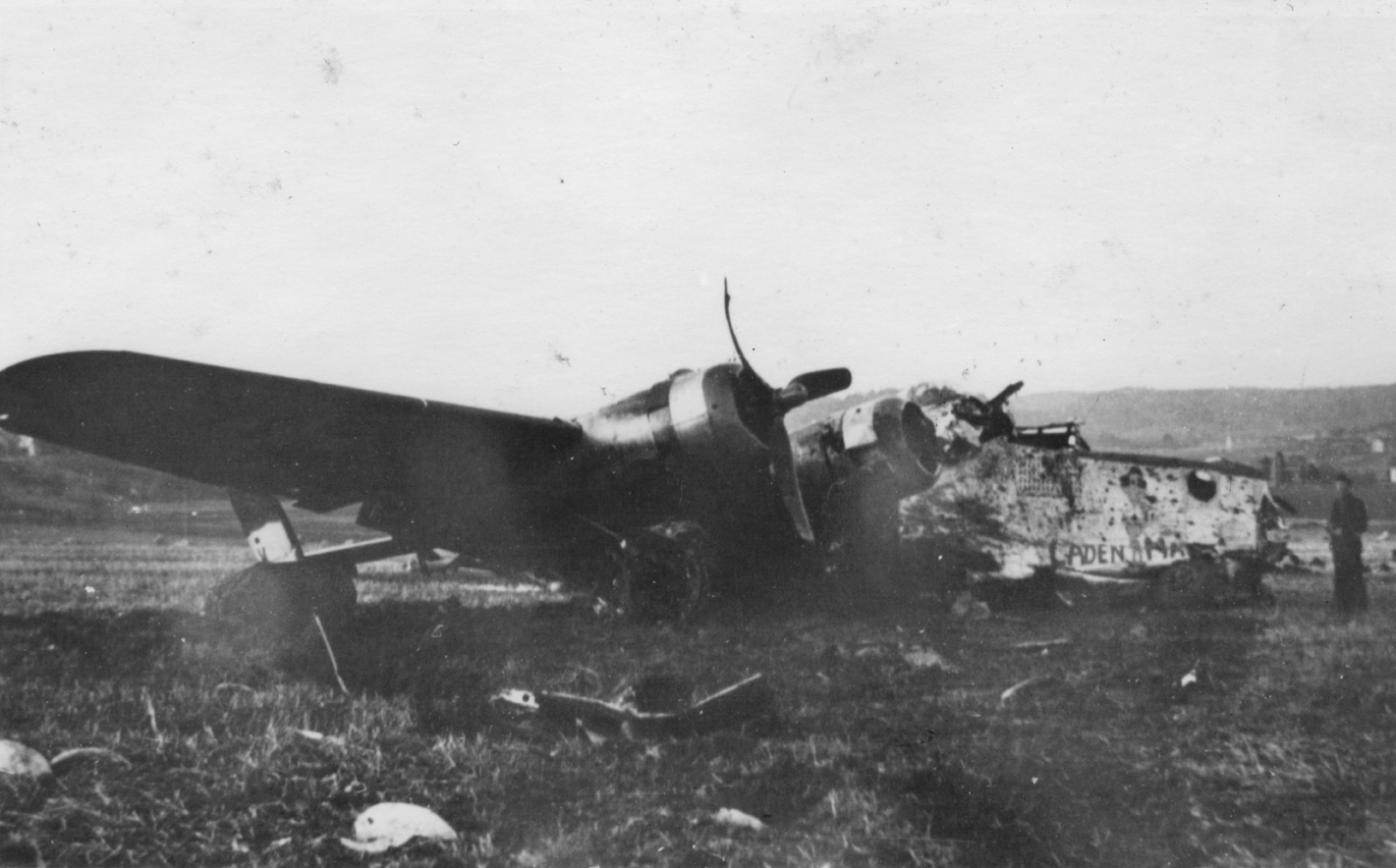 The wreck of a B-24 Liberator (U8-K_, serial number 44-10521) nicknamed "Laden Maiden" of the 786th Bomb Squadron, 466th Bomb Group. Handwritten caption on reverse: '410521. U8-K_ Laden Maiden, 466 BG.'