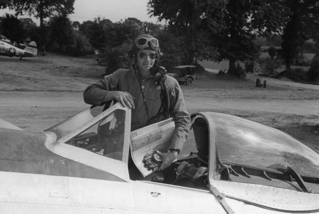 Colonel B Bennick of the 373rd Fighter Group in the cockpit of his P-47 Thunderbolt. Image stamped on reverse: 'Charles E Brown.' [stamp], 'Passed for publication 7 Sept 1944.' [stamp] and '356629.' [Censor no.] Printed caption on reverse: 'Colonel B Bennick in his P-47.'